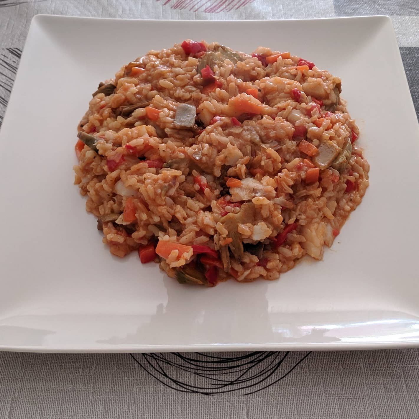 Arroz con bacalao y alcachofas